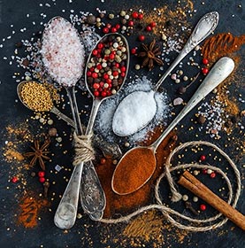 spoons full of spices 